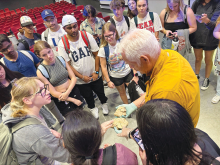 Dr. Dieter Steklis shows human brain to group of students