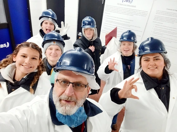 University of Arizona Meat Judging Team in hard hats and coats