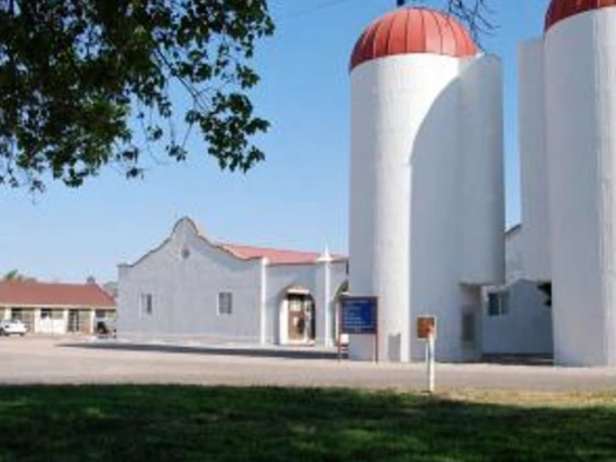 Building and silos at the campus farm