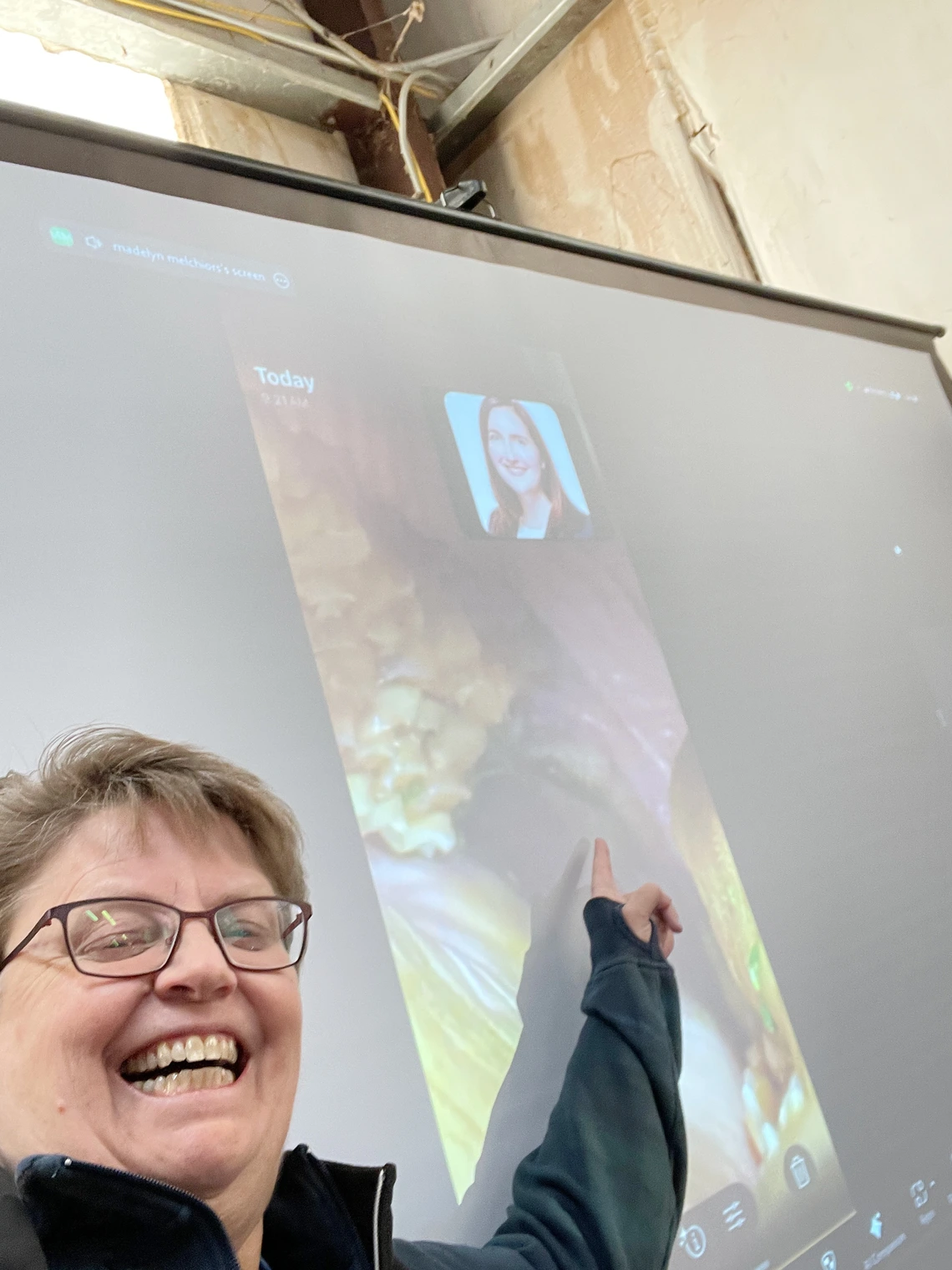 Dr. Greene pointing to video of screen displaying horses mouth