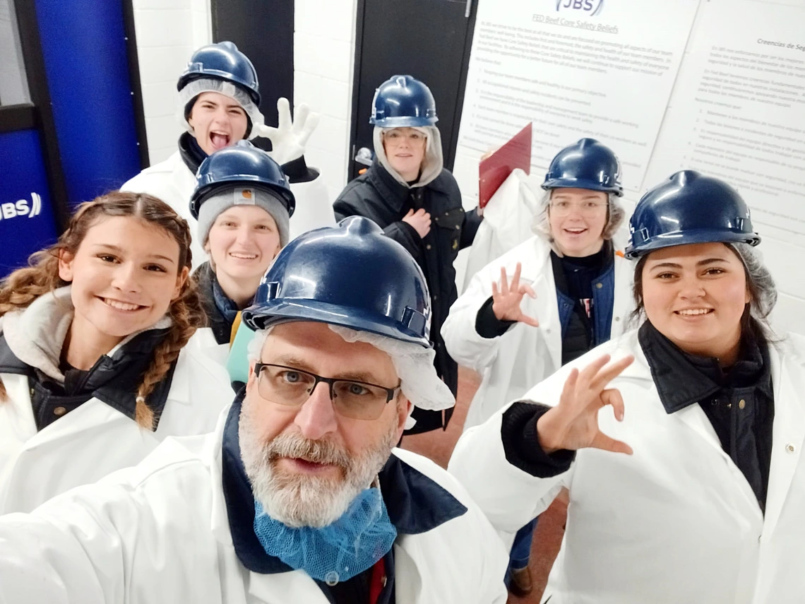 University of Arizona Meat Judging Team in hard hats and coats