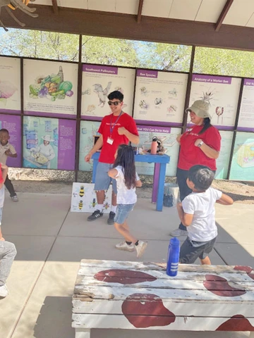 Docent with two children