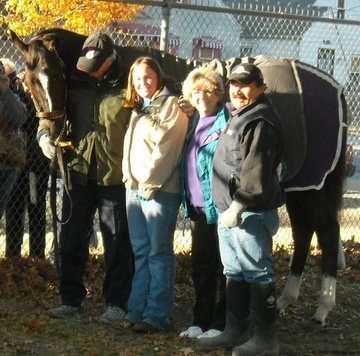 Elizabeth Rogers meets Zenyatta at Churchill Downs in 2010.